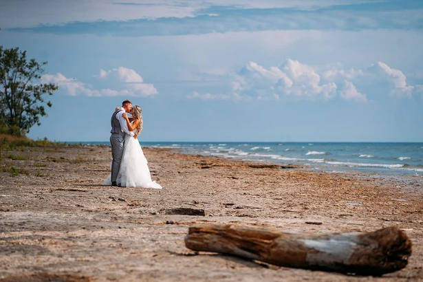 bride and groom at beach